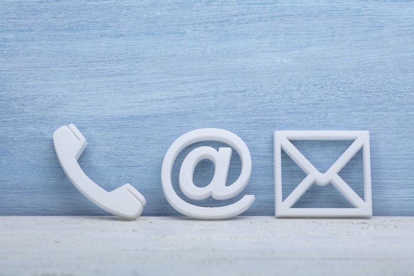 Close-up Of A Phone, Email and Post Icons. Contact us